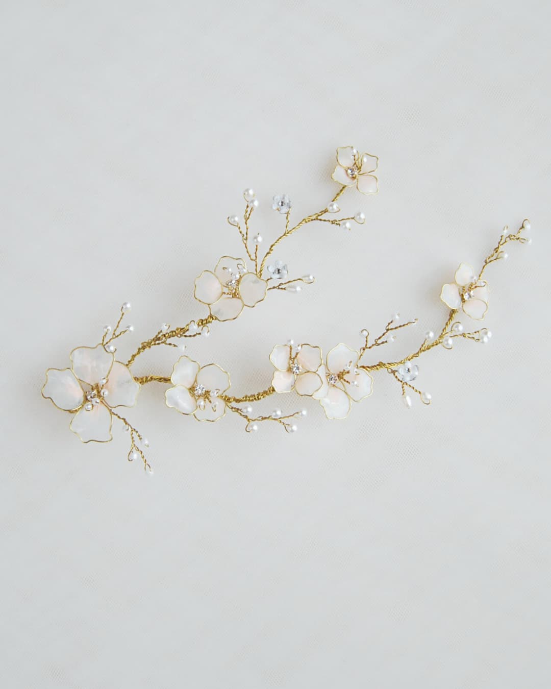 Accessorio laterale per capelli sposa con fiori di ciliegio