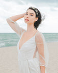 Coroncina con fiori rosa e foglie verdi, l’accessorio perfetto per un’acconciatura sposa semplice e naturale.