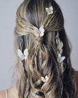 Accessori sposa a forma di farfalla, perfetti per look boho e raffinati.