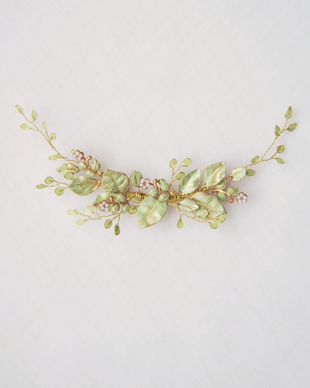 Fermaglio Botanicae per capelli sposa con foglie verdi