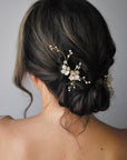 Forcine sposa con fiori di ciliegio rosa, per un tocco floreale elegante e poetico.