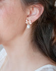 Orecchini pendenti di perla con fiocco rosa