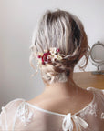 pettinino floreale rosso e rosa per acconciatura raccolta sposa