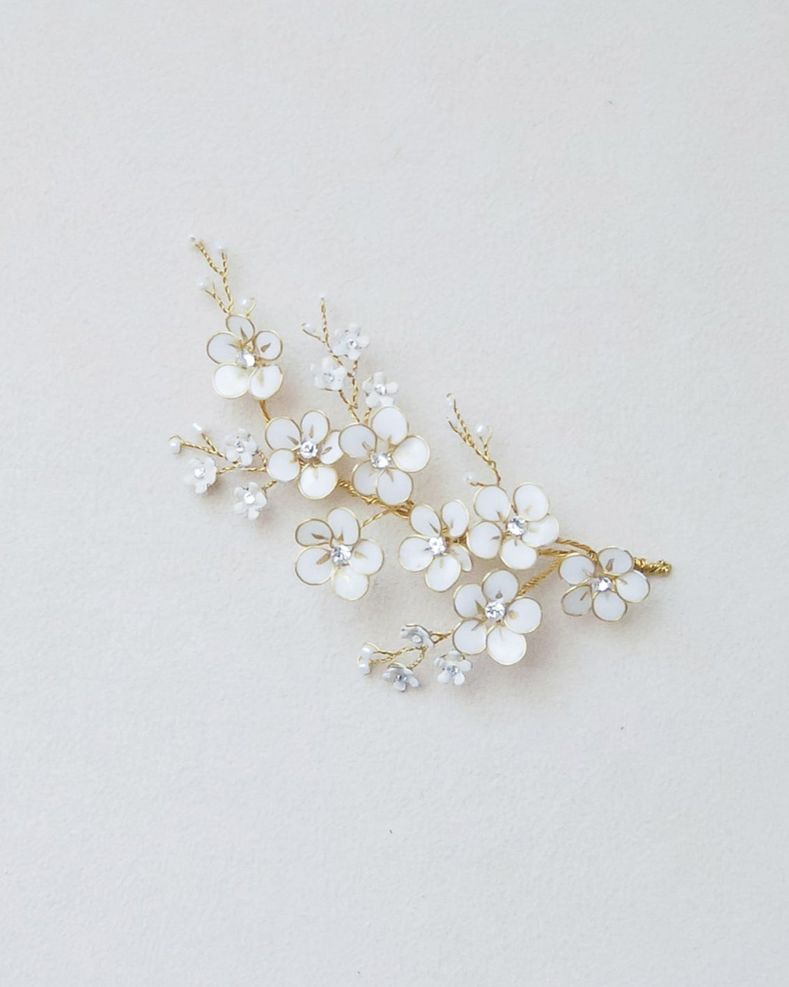 fermaglio di fiorellini bianchi