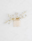Accessorio raffinato con fiori in strass, perfetto per acconciature sofisticate.