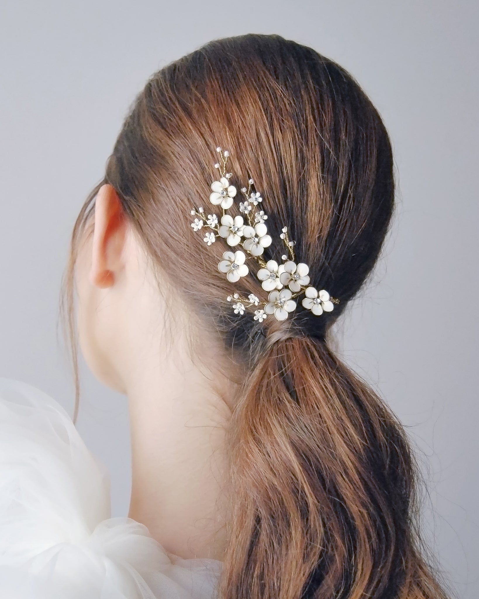 Fermaglio di fiorellini sposa