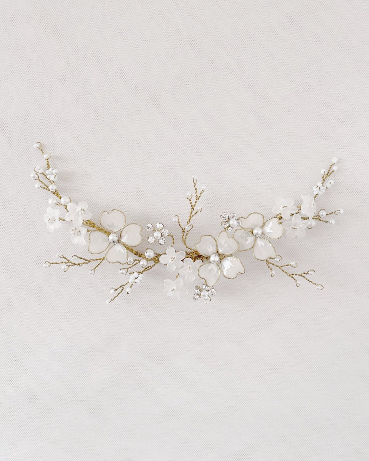 Fermaglio gioiello di fiori frangipane