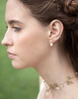 Orecchini pendenti con perle di fiume e oro per sposa elegante