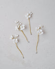 Forcine Biancospino Petite per capelli da sposa con fiorellini bianchi dal tocco delicato e romantico.