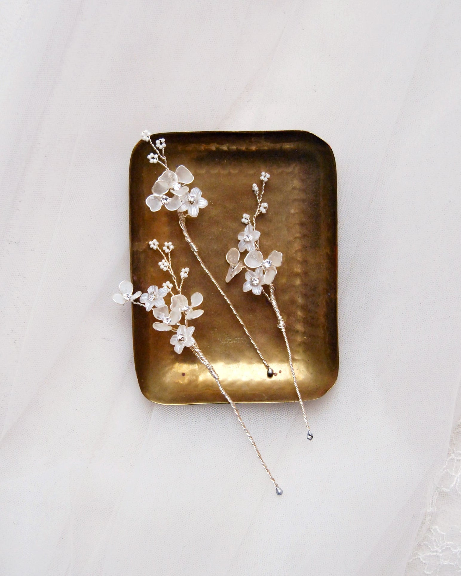forcine per capelli da sposa con fiorellini delicati