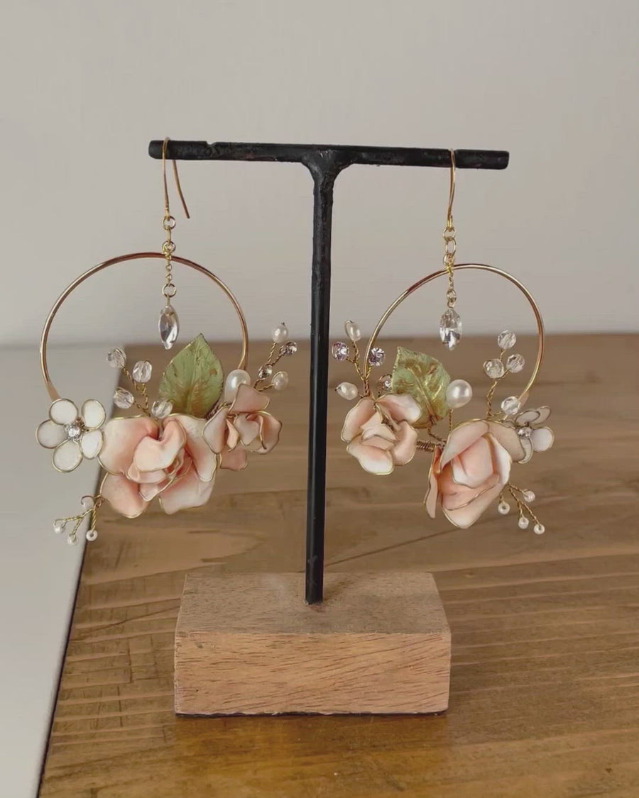 Round floral pendant earrings
