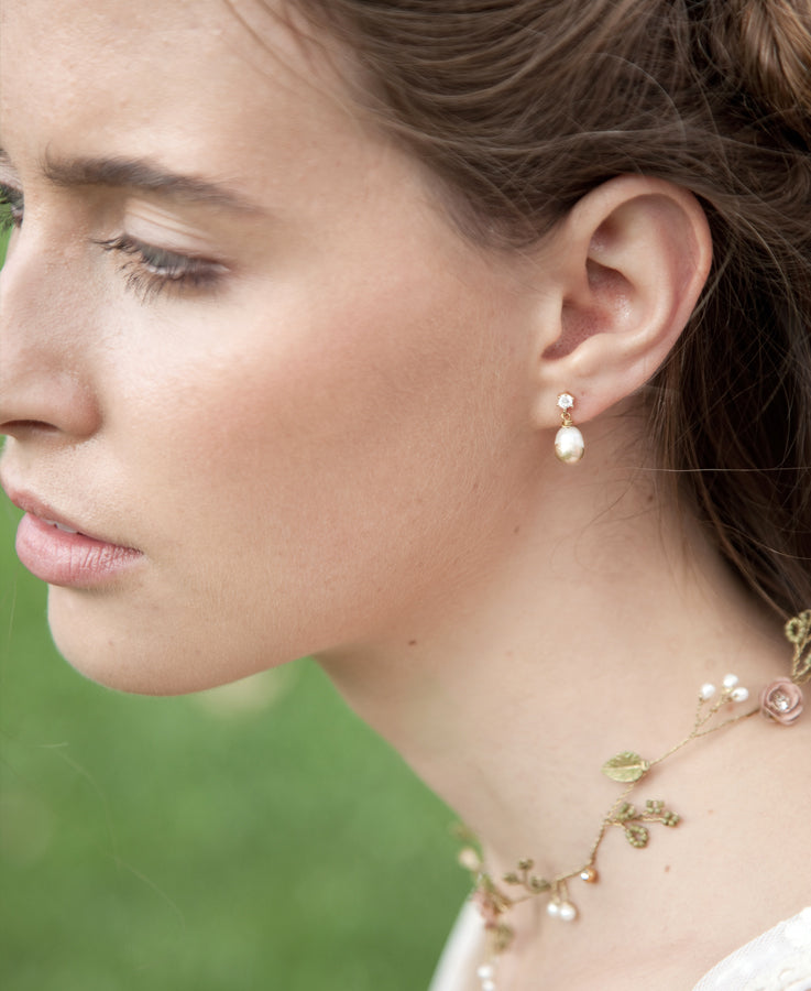 Pearl and gold leaf earrings