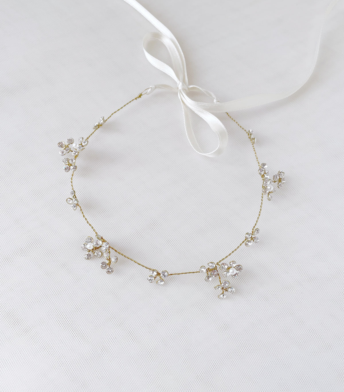 Coroncina Brillaflora con fiorellini di cristalli Swarovski e perline giapponesi su filo placcato oro - Elibre